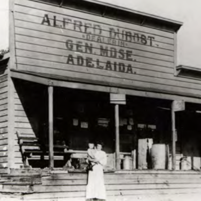 Alexandrine Dubost in front of Dubost General Store and Post Office